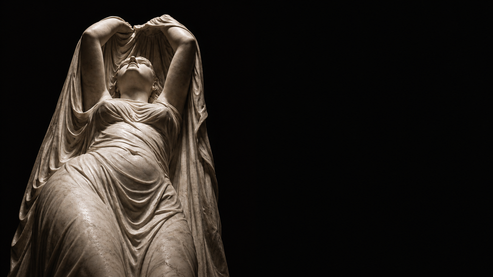 Draped female marble statue